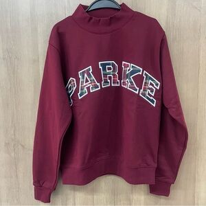 Burgundy Sweatshirt with Plaid Lettering parke